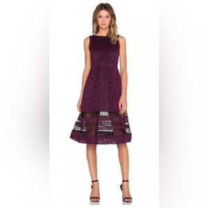 Alice and Olivia Ofelia tea length lace dress in plumb 
Size 8